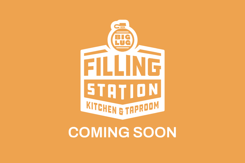 Goldenrod background with big lug filling station logo and 